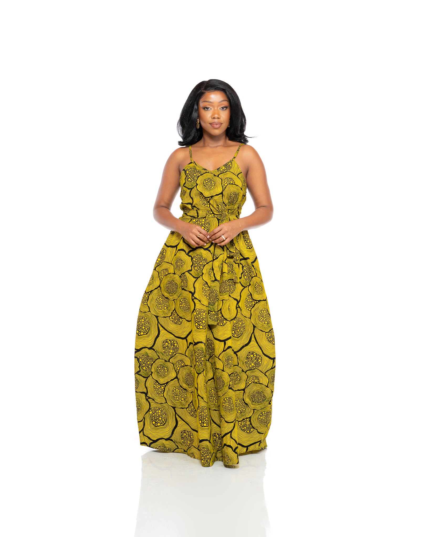 Yellow and black African print Ankara maxi dress with spaghetti straps and flowing skirt, elegant women’s wax print fashion Kenya.